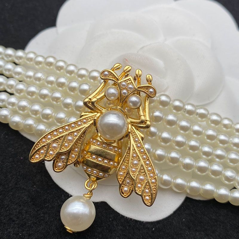 Hot Dior Bee Bracelet In Metal and White Resin Pearls Gold