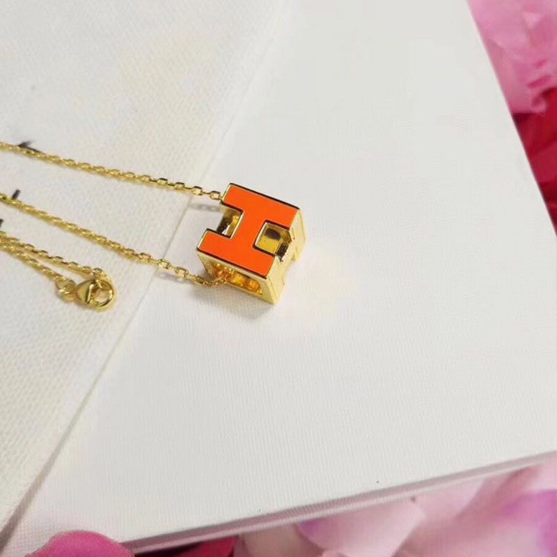 Hermes Cage D'H Pendant Necklace In Orange