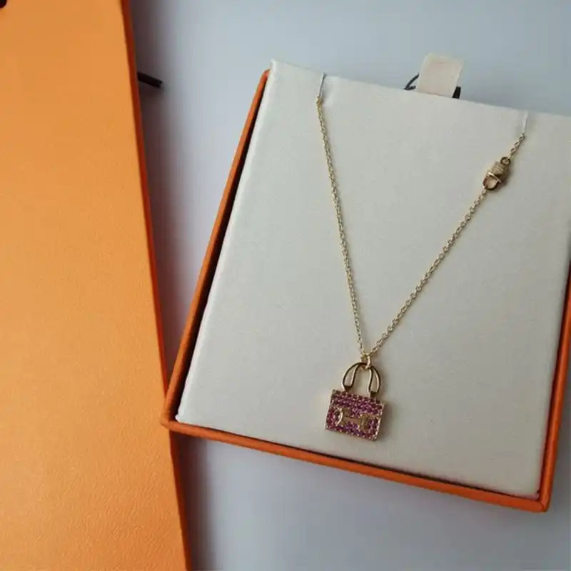 Hermes Constance Amulette Pendant Necklace In Pink