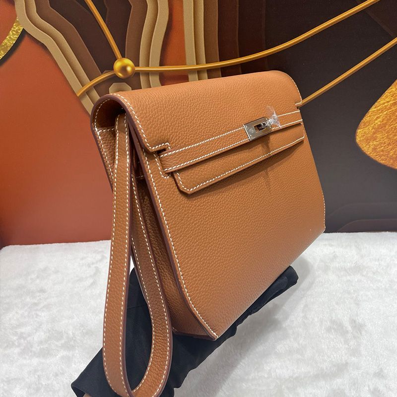 Hermes Kelly Depeches 25 Pouch Togo Leather In Brown