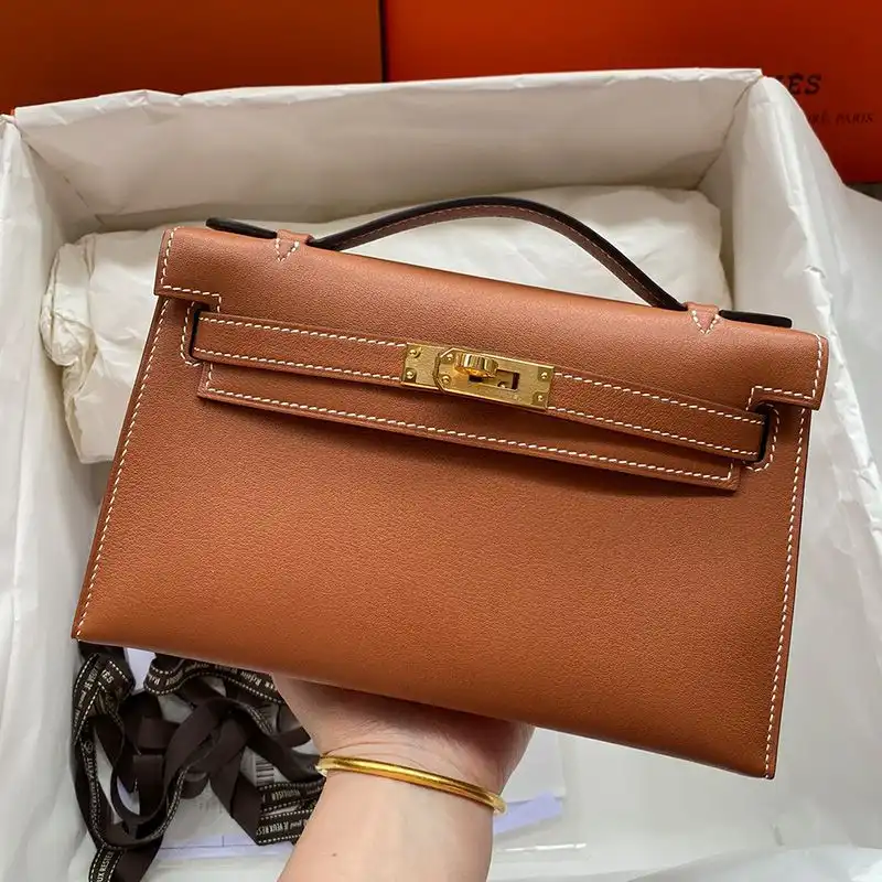 Hermes Kelly Pochette Swift Leather Gold Hardware In Brown