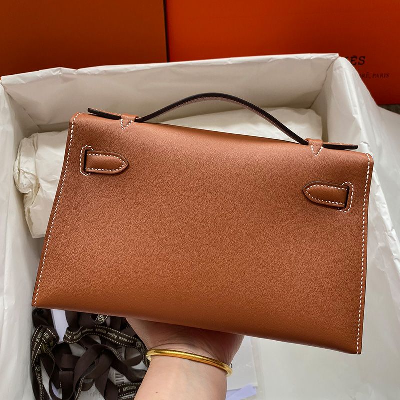 Hermes Kelly Pochette Swift Leather Gold Hardware In Brown