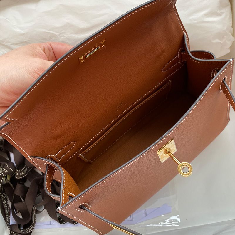 Hermes Kelly Pochette Swift Leather Gold Hardware In Brown