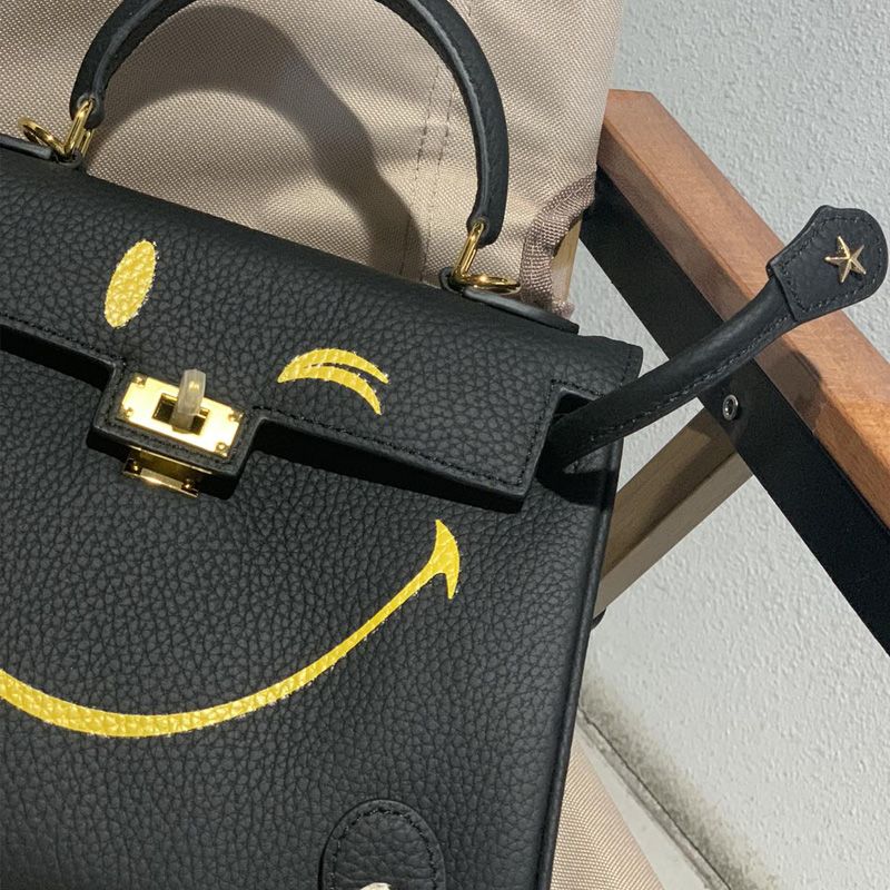 Hermes Kelly Bag with Smiling Print Togo Leather Gold Hardware In Black