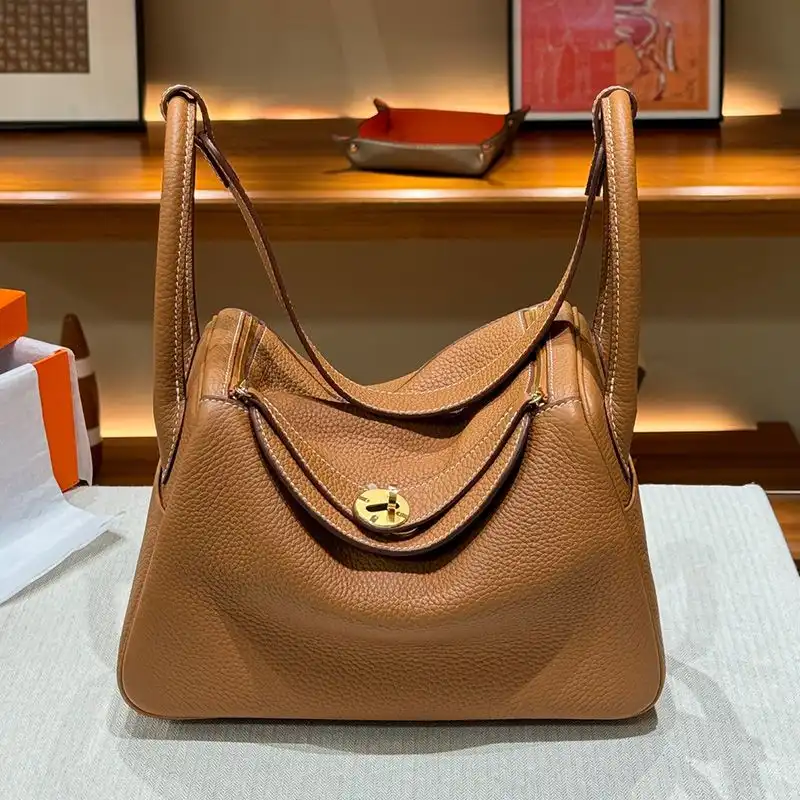 Hermes Lindy Bag Clemence Leather Gold Hardware In Brown