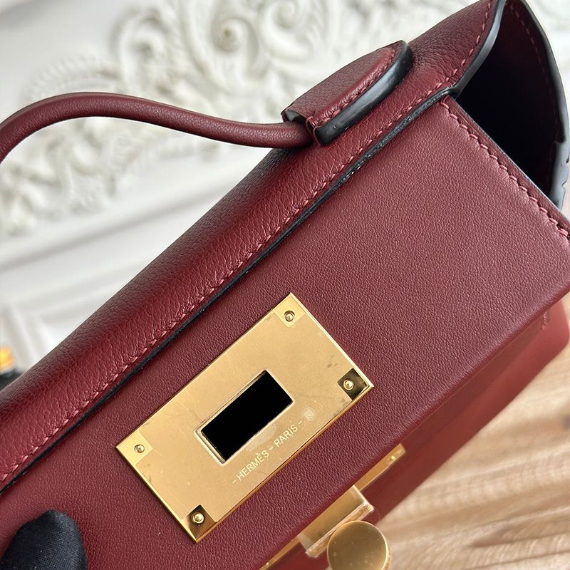 Hermes Mini 24 24 Bag Evercolor Swift Leather Gold Hardware In Burgundy