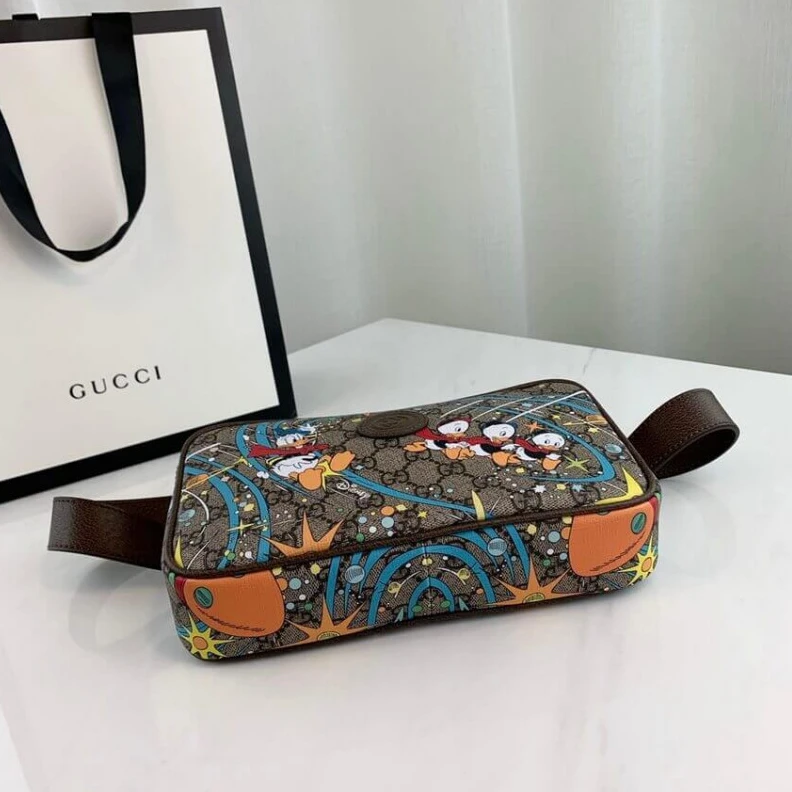 Replica bags Legendary Disney x Gucci Donald Duck Print Belt Bag