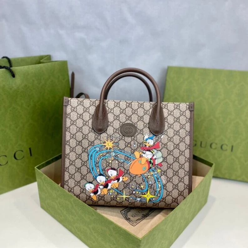 Louis vuitton locations Top handl Disney x Gucci Donald Duck Tote Bag