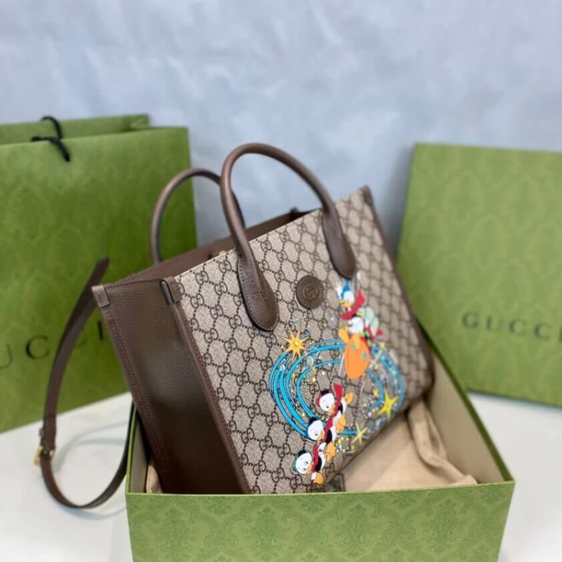 Louis vuitton locations Top handl Disney x Gucci Donald Duck Tote Bag