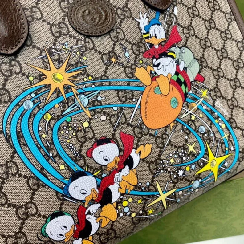 Louis vuitton locations Top handl Disney x Gucci Donald Duck Tote Bag