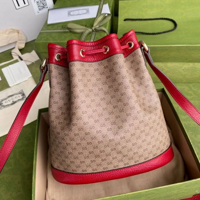 Replica bags lv Shiny gol Doraemon x Gucci Small Bucket Bag