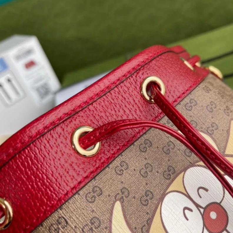 Replica bags lv Shiny gol Doraemon x Gucci Small Bucket Bag