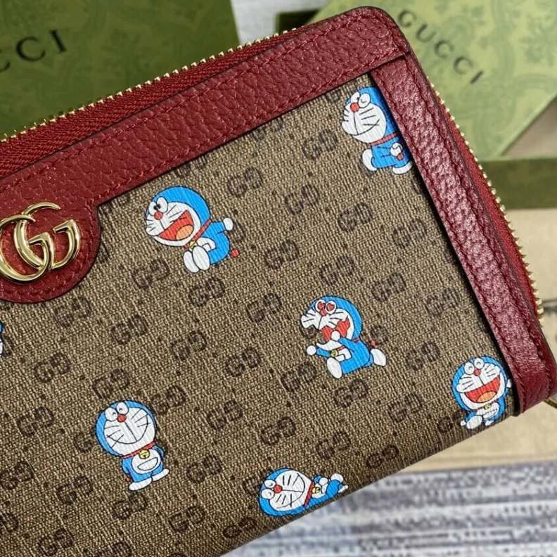 Replica bags Twelve ca Doraemon x Gucci Zip Around Wallet 647787 in Blue