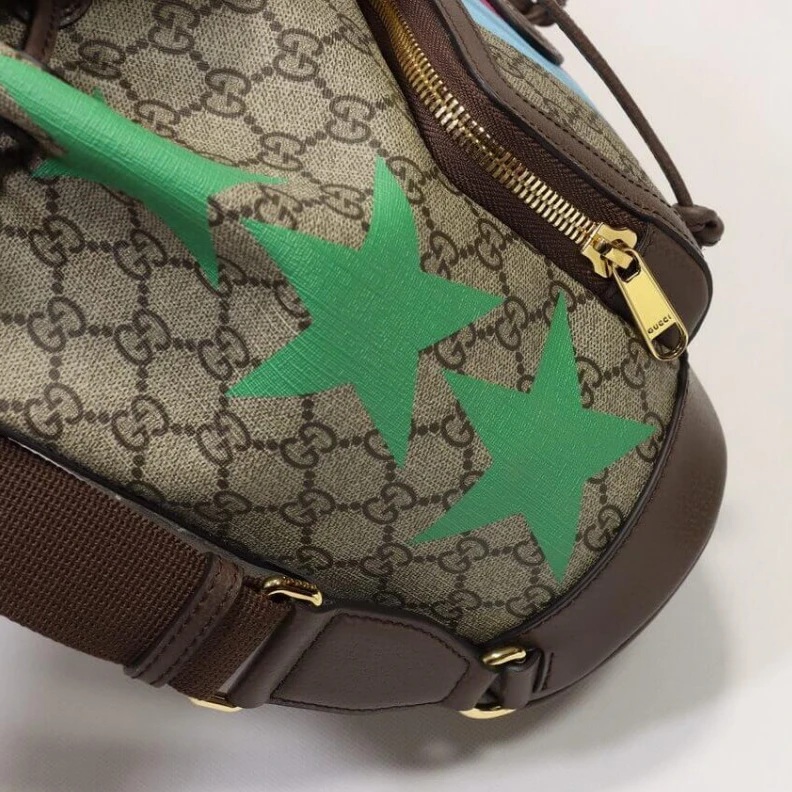 Louis vuitton locations Outside: Gucci Backpack with Interlocking G