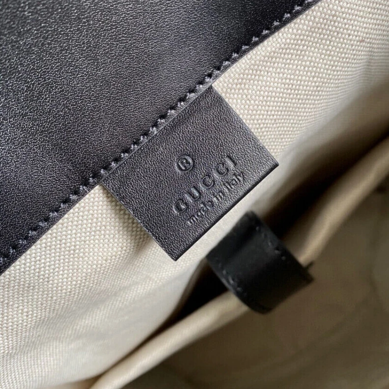 Louis vuitton locations Top handl Gucci GG Embossed Backpack Black
