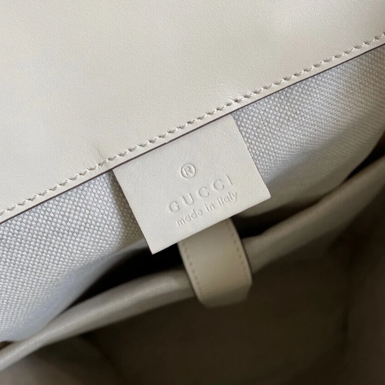 Exterior: Gucci GG Embossed Backpack White