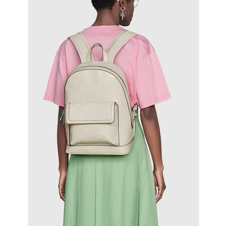 Louis vuitton locations Tonal lea Gucci GG Embossed Backpack in White Leather
