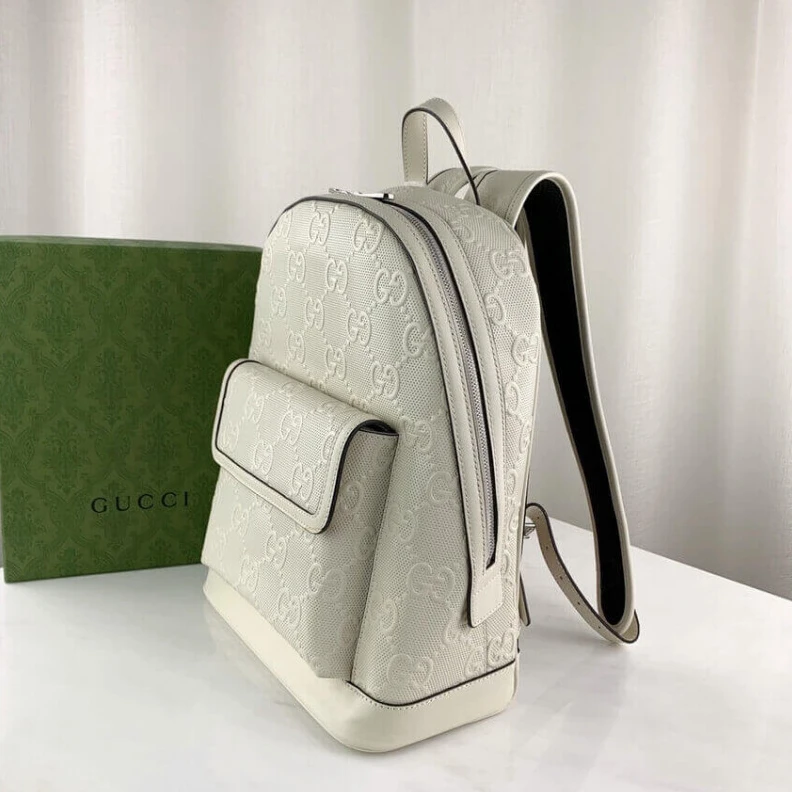 Louis vuitton locations Tonal lea Gucci GG Embossed Backpack in White Leather