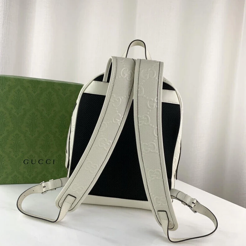 Louis vuitton locations Tonal lea Gucci GG Embossed Backpack in White Leather