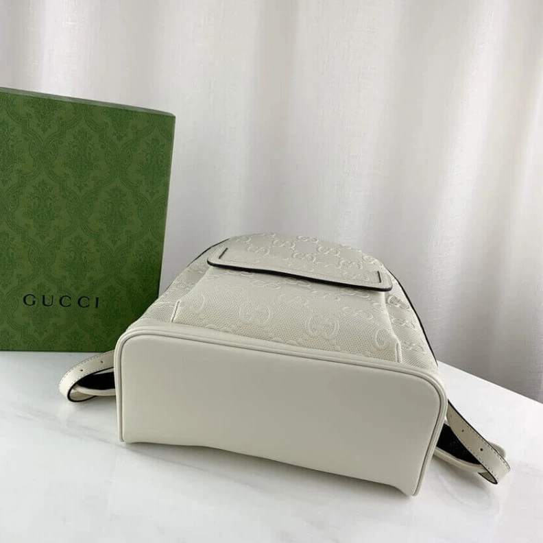 Louis vuitton locations Tonal lea Gucci GG Embossed Backpack in White Leather
