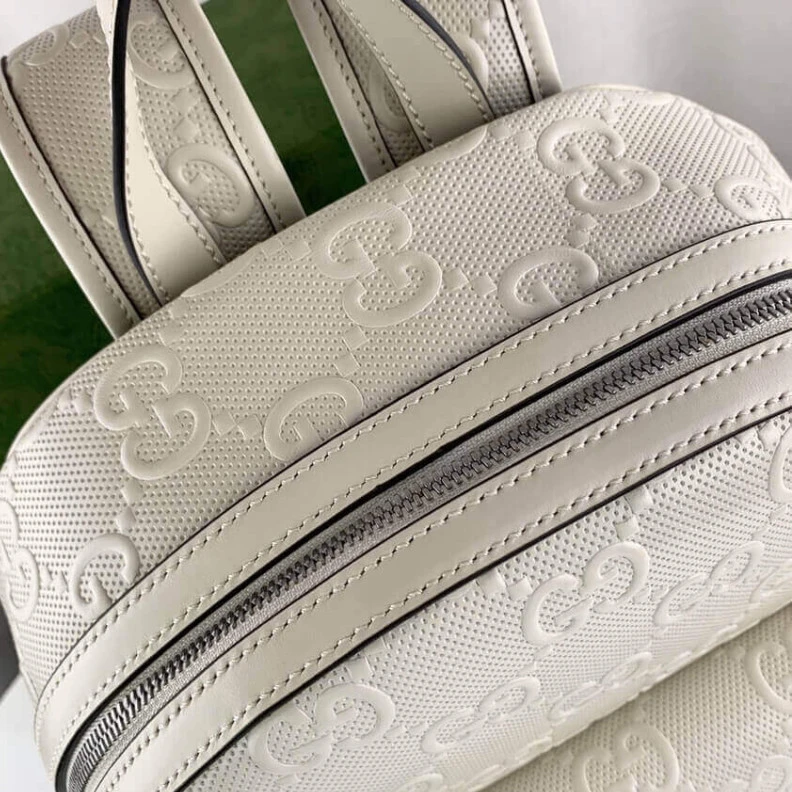 Louis vuitton locations Tonal lea Gucci GG Embossed Backpack in White Leather