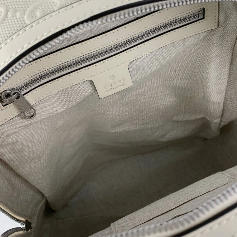 Louis vuitton locations Tonal lea Gucci GG Embossed Backpack in White Leather