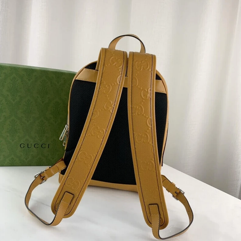 Kitlife White GG Gucci GG Embossed Backpack in Yellow Leather
