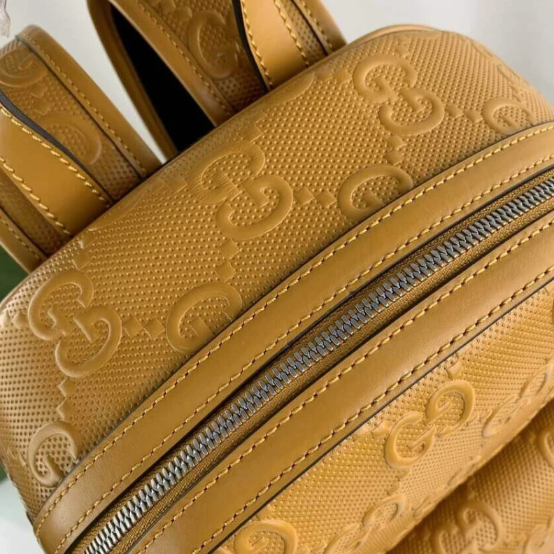 Kitlife White GG Gucci GG Embossed Backpack in Yellow Leather