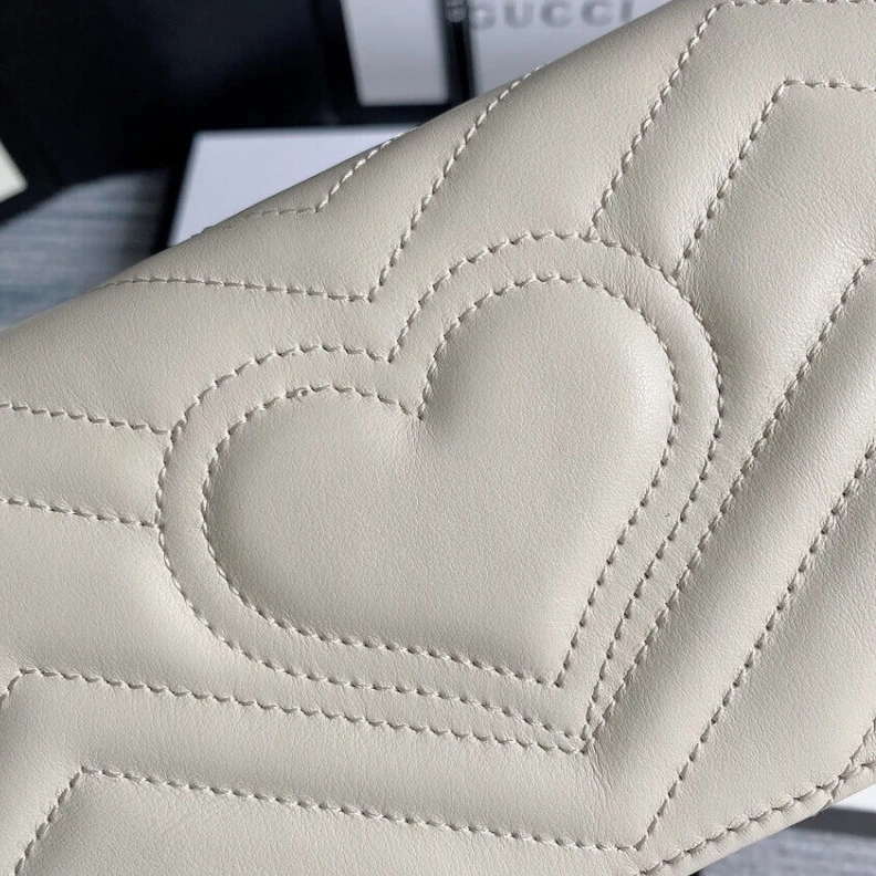 Lv belts replica Covered m Gucci GG Marmont Mini Bag In White Leather