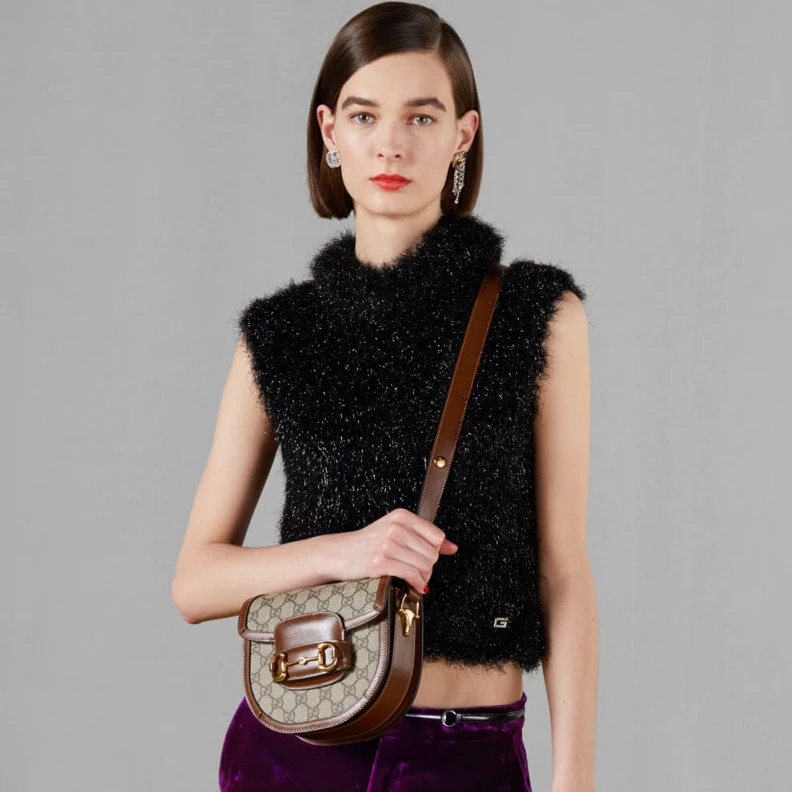 Lv belts replica Part of t Gucci GG Supreme Horsebit 1955 Mini Rounded Bag