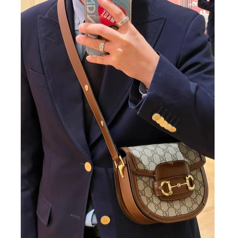Lv belts replica Part of t Gucci GG Supreme Horsebit 1955 Mini Rounded Bag