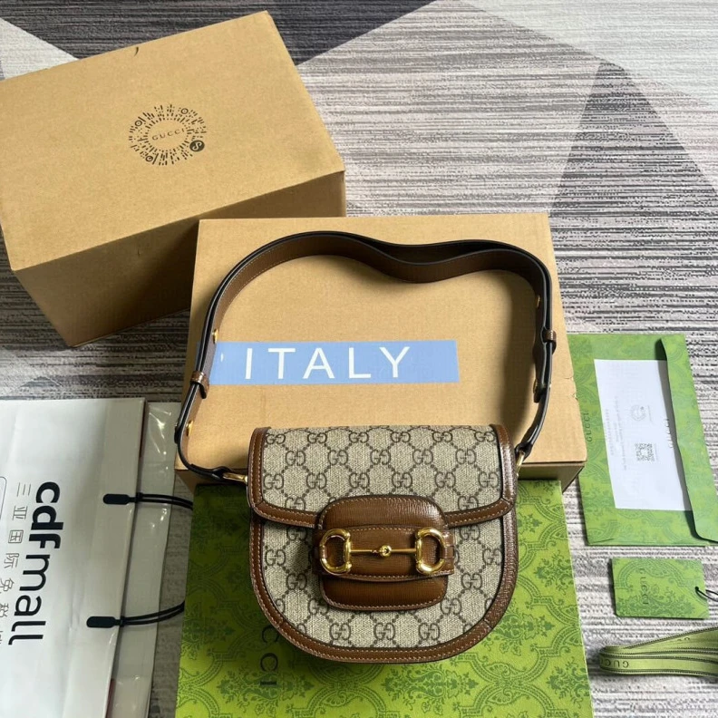 Lv belts replica Part of t Gucci GG Supreme Horsebit 1955 Mini Rounded Bag