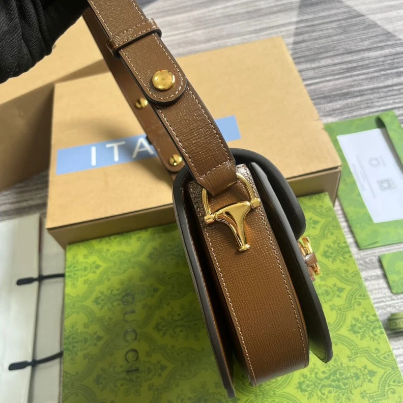Lv belts replica Part of t Gucci GG Supreme Horsebit 1955 Mini Rounded Bag