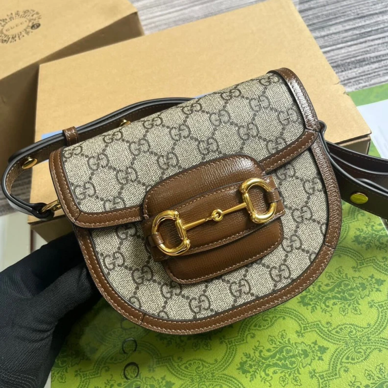 Lv belts replica Part of t Gucci GG Supreme Horsebit 1955 Mini Rounded Bag