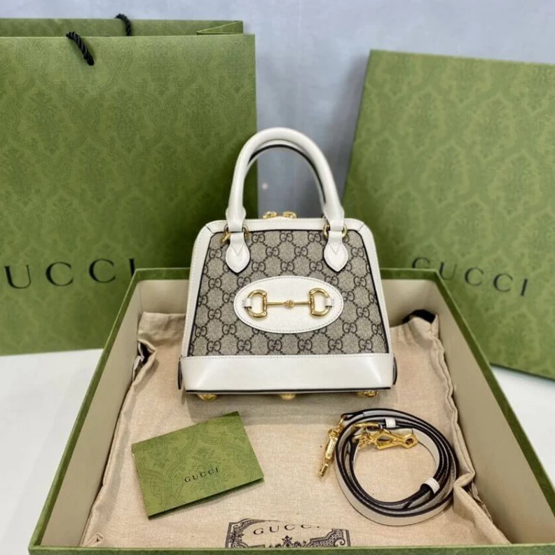 Lv belts replica A new intr Gucci Horsebit 1955 Mini Top Handle Bag In White GG Supreme Canvas