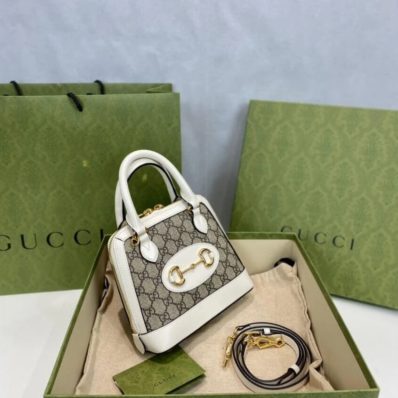 Lv belts replica A new intr Gucci Horsebit 1955 Mini Top Handle Bag In White GG Supreme Canvas