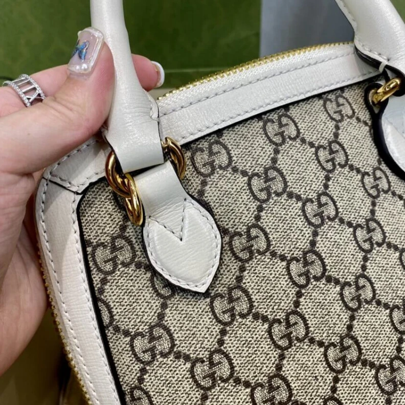 Lv belts replica A new intr Gucci Horsebit 1955 Mini Top Handle Bag In White GG Supreme Canvas