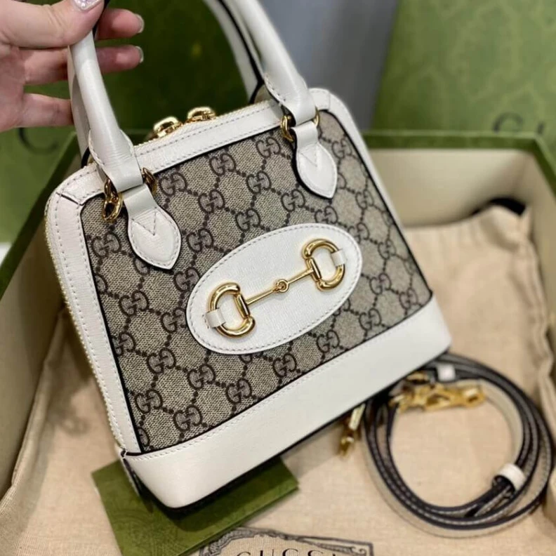 Lv belts replica A new intr Gucci Horsebit 1955 Mini Top Handle Bag In White GG Supreme Canvas