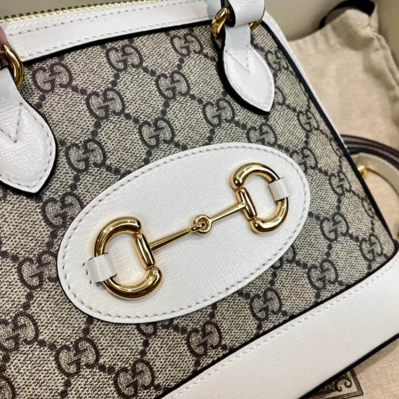 Lv belts replica A new intr Gucci Horsebit 1955 Mini Top Handle Bag In White GG Supreme Canvas