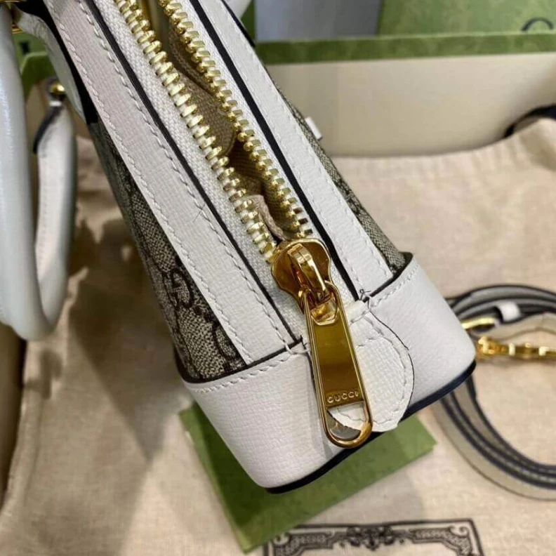 Lv belts replica A new intr Gucci Horsebit 1955 Mini Top Handle Bag In White GG Supreme Canvas