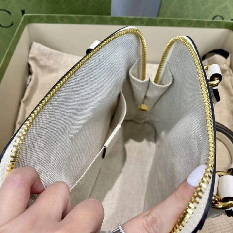 Lv belts replica A new intr Gucci Horsebit 1955 Mini Top Handle Bag In White GG Supreme Canvas