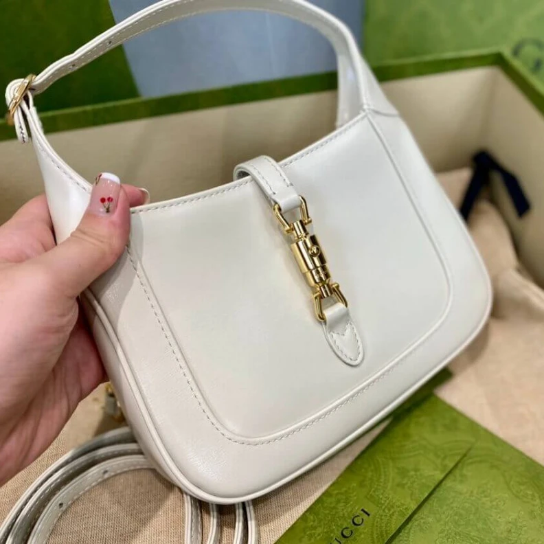 Lv belts replica Goldtoned Gucci Jackie 1961 Mini Hobo Bag In White Leather