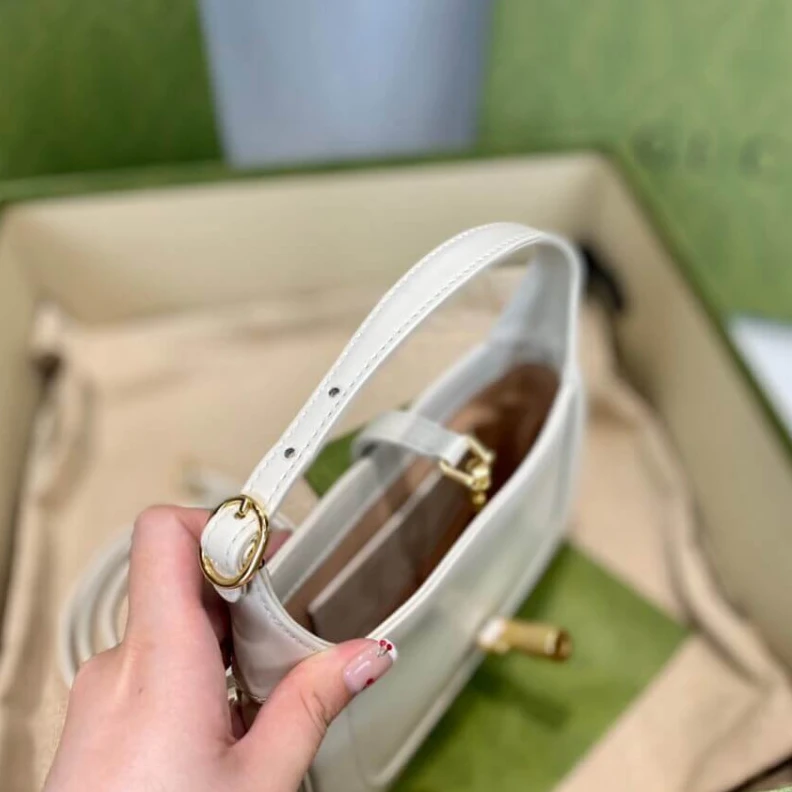 Lv belts replica Goldtoned Gucci Jackie 1961 Mini Hobo Bag In White Leather