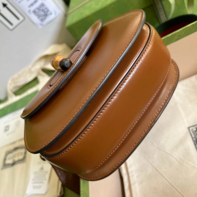 Replica bag Inside: c Gucci Mini Top Handle Bag with Bamboo Cuir