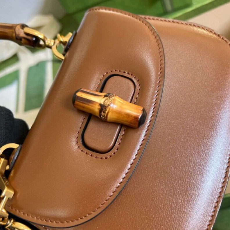 Replica bag Inside: c Gucci Mini Top Handle Bag with Bamboo Cuir
