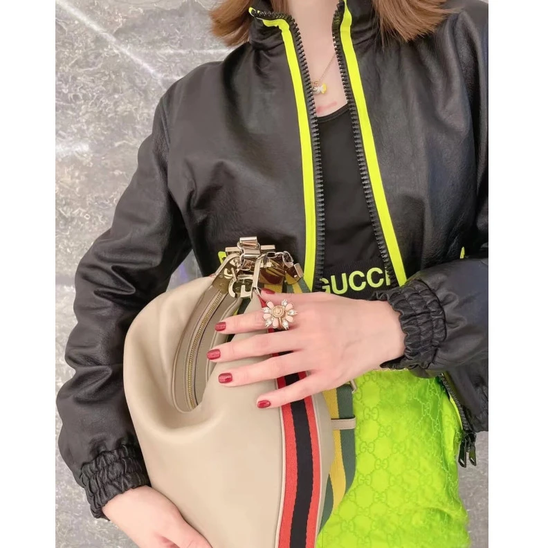 Inside: 1 Gucci Oatmeal Leather Attache Medium Shoulder Bag