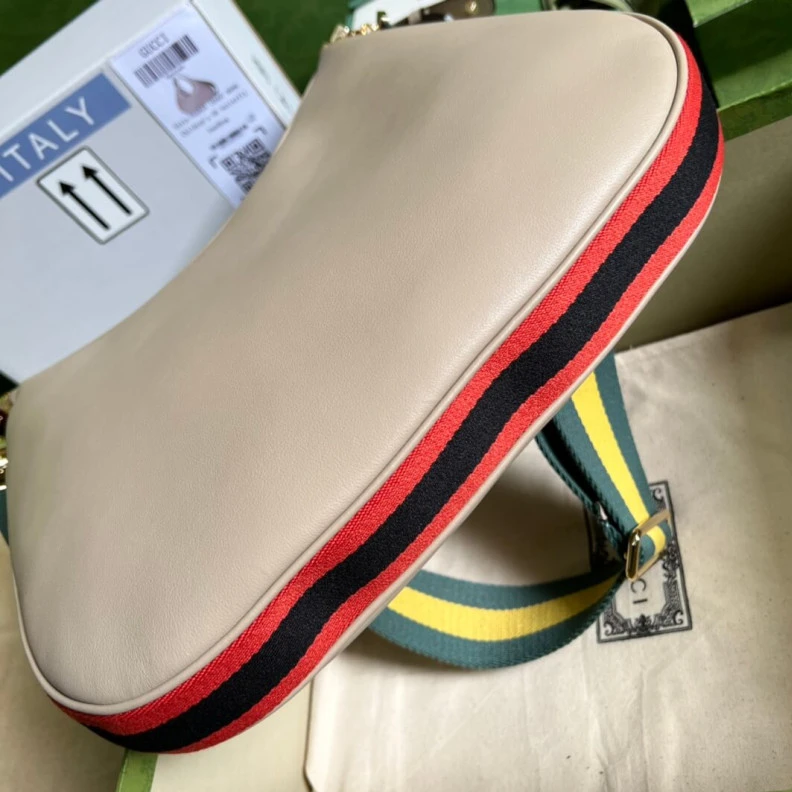 Inside: 1 Gucci Oatmeal Leather Attache Medium Shoulder Bag