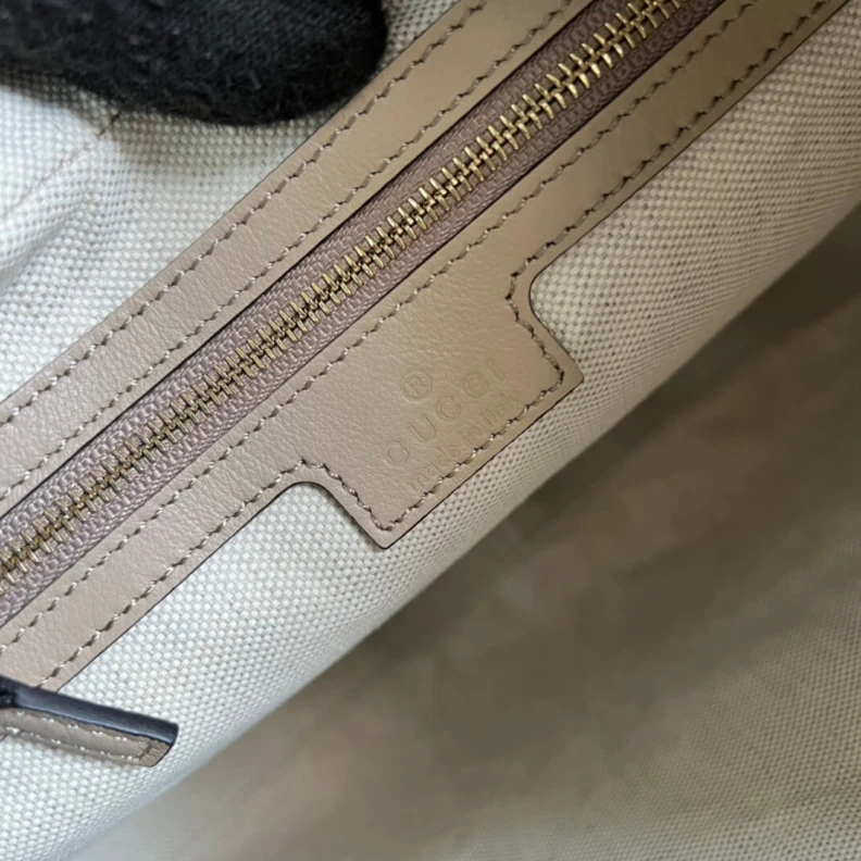 Inside: 1 Gucci Oatmeal Leather Attache Medium Shoulder Bag