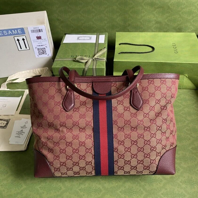 Replica bag The world Gucci Ophidia Medium Tote With Web in Burgundy GG Canvas