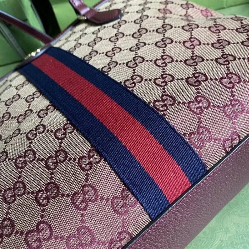 Replica bag The world Gucci Ophidia Medium Tote With Web in Burgundy GG Canvas